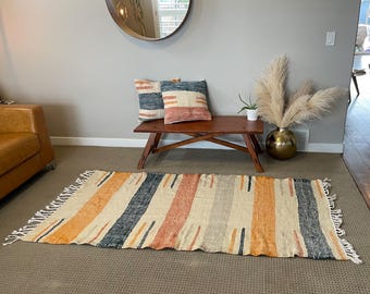 Orange and turquoise wave kilim rug