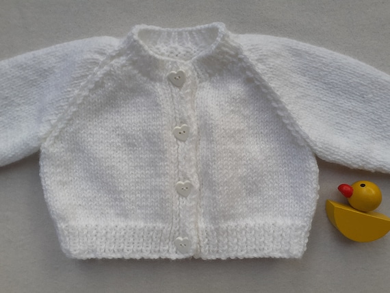 newborn white cardigan