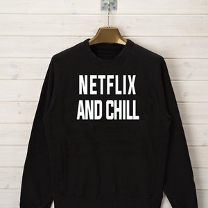 Netflix And Chill Unisex  Sweatshirt Available in Black And Gray.