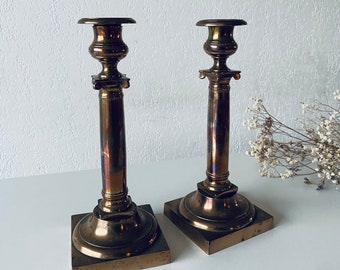 Pair of bronze empire candlesticks
