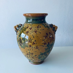 Large terracotta jar shaped vase
