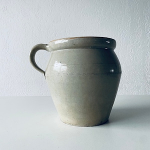 Antique jug in glazed terracotta