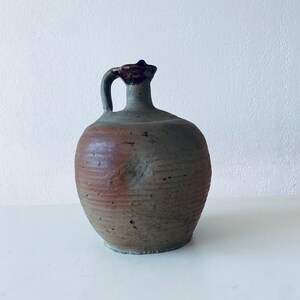 Antique terracotta jug