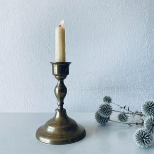 Antique brass candle holder