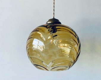 Suspensión de bola de vidrio ámbar