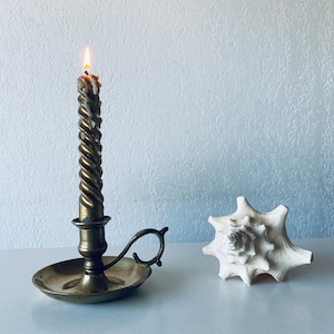Antique brass candle holder