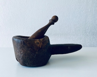 Antique wooden mortar and pestle