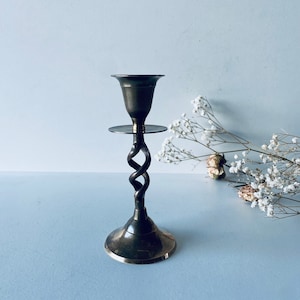 Golden brass candle holder