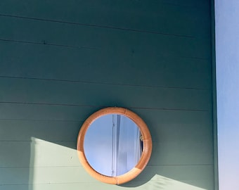 Round rattan mirror