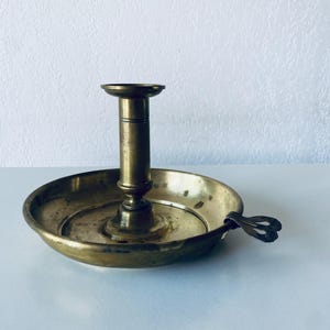 Old brass candle holder
