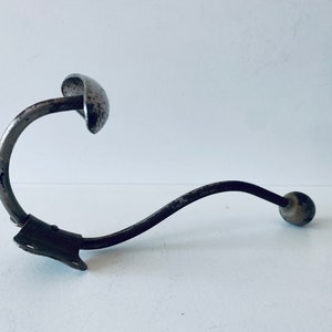 Ancient metal patère