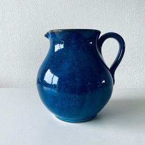 Old enamelled stoneware pitcher
