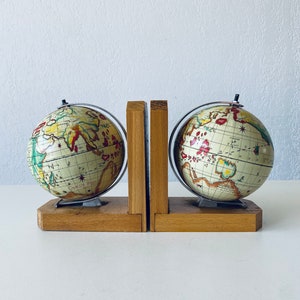 Paire de serre livres mappemonde