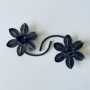Pair of iron water lily candle holders