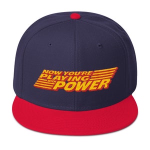 Playing with Power Snapback Hat