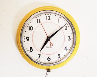 Westclox "Orb" Midcentury Yellow Electric Wall Clock 1951