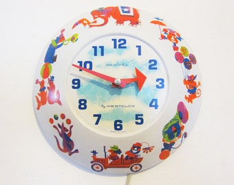 Westclox Wee Winkie Circus Parade 1960s electric wall clock