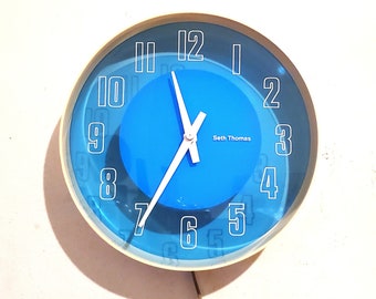 Seth Thomas "Coloraide" Blue Lucite White Plastic Mod Electric Wall Clock 1970s