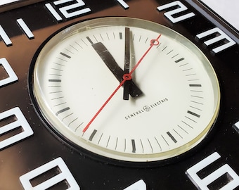 General Electric Black and White Lucite Electric Wall Clock 1970s