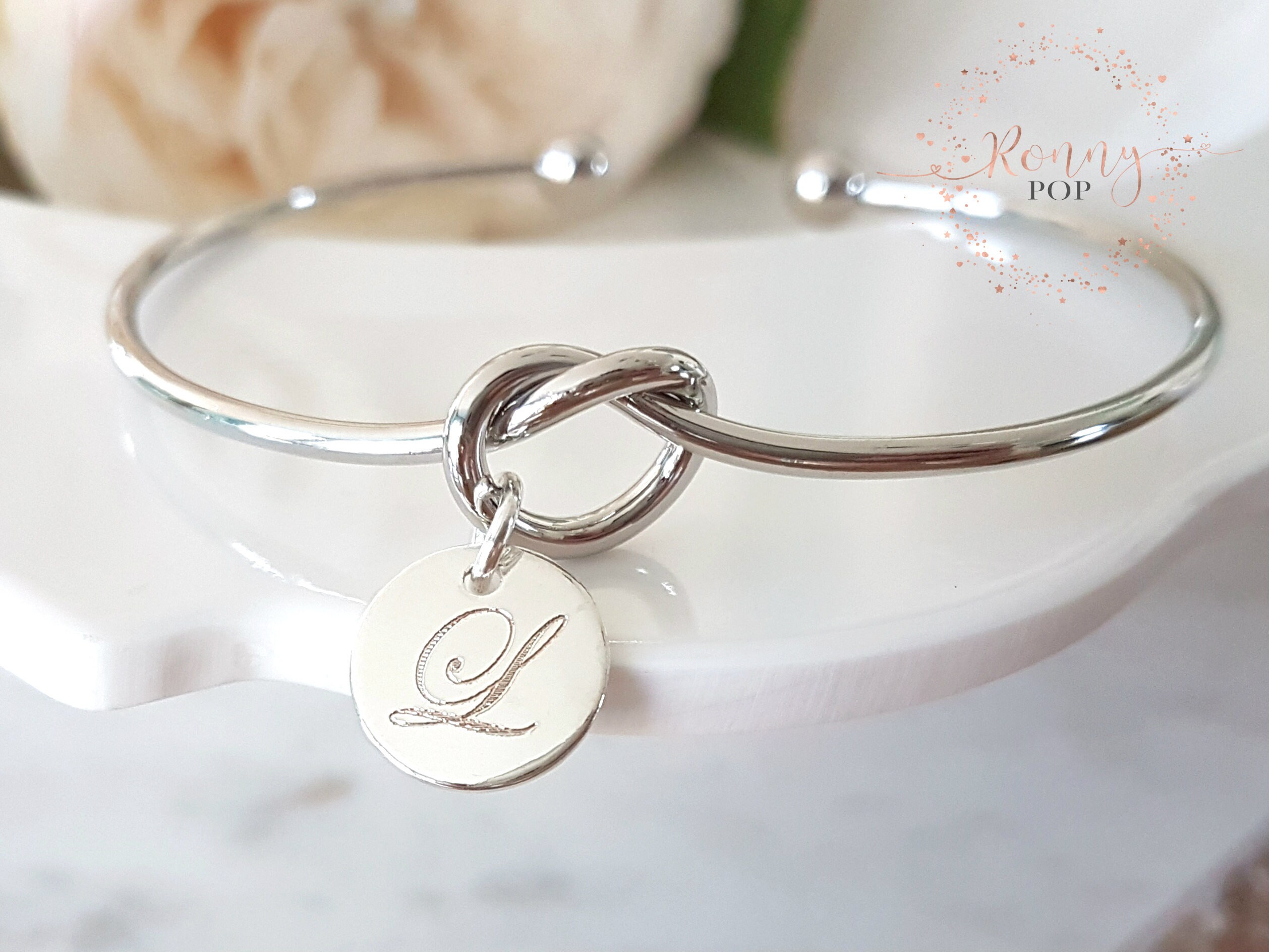 Initial knot best sale bracelet