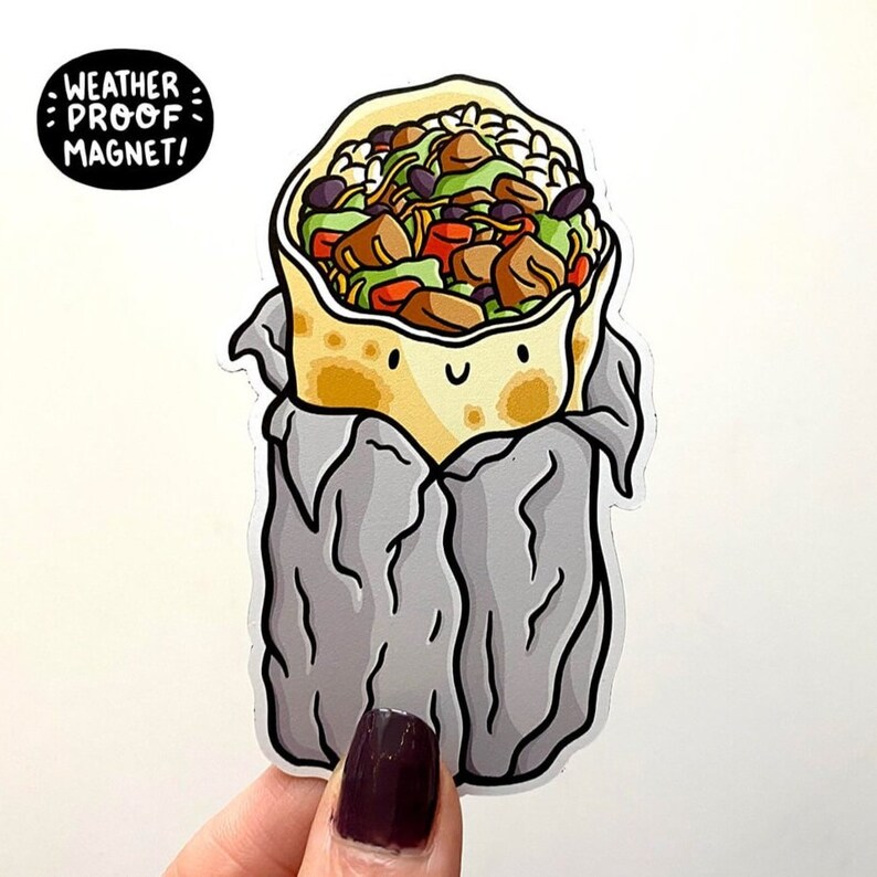 May include: A cartoon burrito with a smiling face, wrapped in foil, with the text "Weather Proof Magnet!" above it.