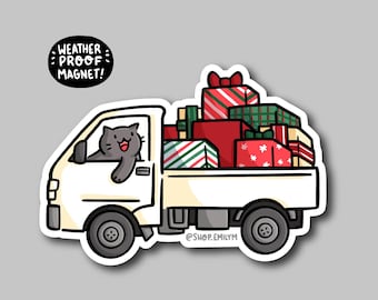May include: A white cartoon truck filled with wrapped gifts, driven by a gray cat. The gifts are red, green, and white with various patterns. A black circular magnet reads "WEATHER PROOF MAGNET!"