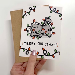 Kleine Weihnachtslicht-Katzen-Weihnachtskarte | Graue Katzenkarte| Weihnachtskarte | Fröhlich| Süße Katzen Karte | Weihnachtsbriefpapier| Katzen Weihnachtskarten