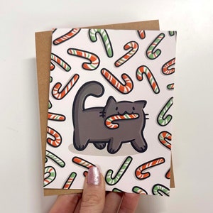 Tarjeta navideña con forma de gato de bastón de caramelo / Gato gris / Tarjeta navideña / Tarjetas navideñas con forma de bastón de caramelo / Tarjeta con forma de gato lindo / Papelería navideña / Tarjeta con forma de gato negro