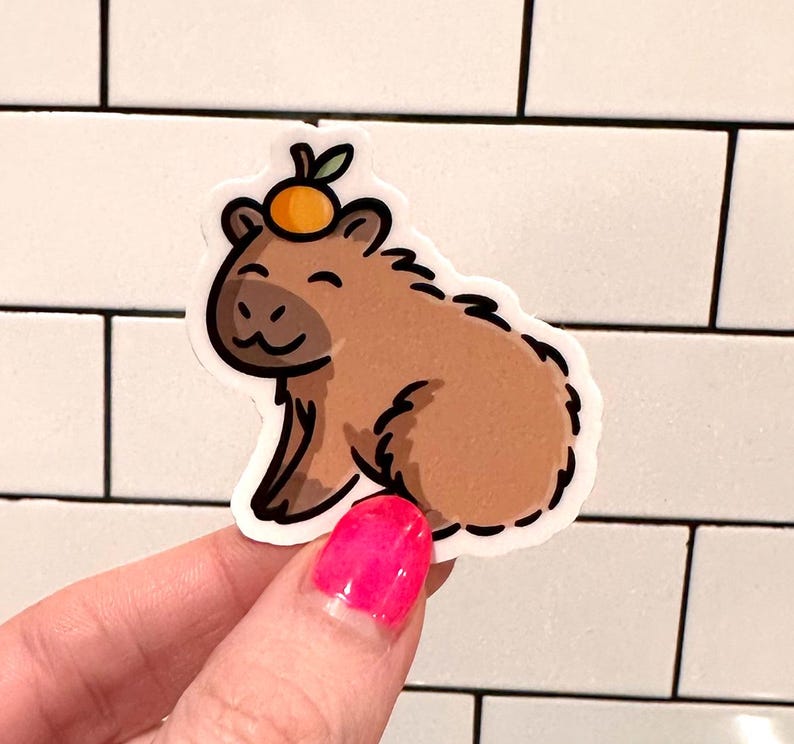 Mini Capybara Sticker | cute animal sticker | capybara with an orange sticker | happy capybara sticker | kawaii animals sticker | zoo animal image 4