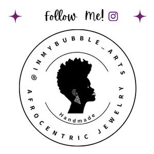 May include: Black and white logo for a jewelry business called "Afrocentric Jewelry Arts". The logo features a silhouette of a woman's head with a large earring. The text "Handmade" is written below the silhouette.