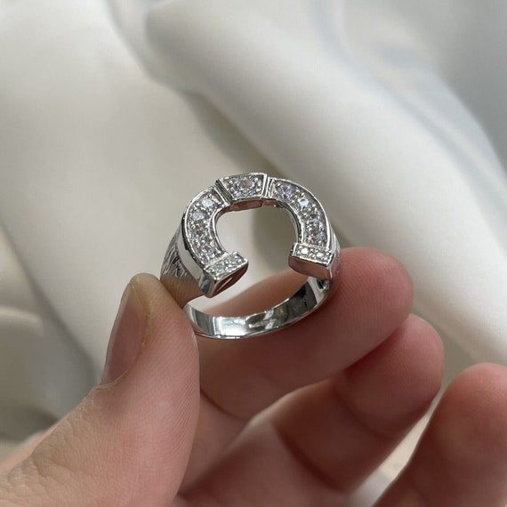 Sterling Silver CZ horseshoe ring. Sterling Silver CZ horseshoe ring.