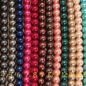 Pu&ograve; includere: Diciotto fili di perle di vari colori, tra cui bianco, nero, argento, blu, rosa, rosso, marrone, verde e viola. Le perle sono numerate da 1 a 18.