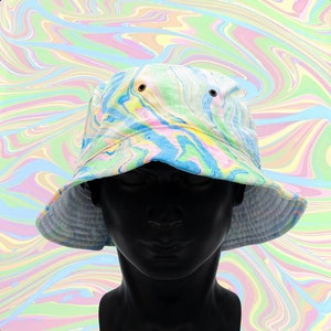 May include: A colorful bucket hat with a swirl pattern in shades of blue, green, pink, and yellow. The hat is made of a lightweight fabric and has a wide brim.