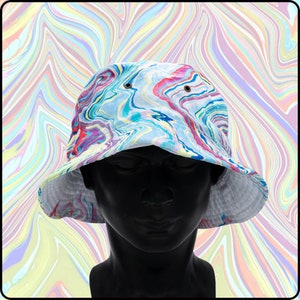 May include: A white bucket hat with a colorful marbled pattern in shades of blue, pink, yellow, and green. The hat is on a mannequin head.