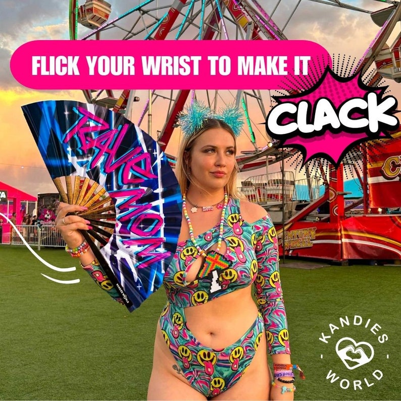 May include: A woman wearing a colorful, psychedelic print bodysuit with a cutout design. She is holding a black and blue hand fan with the words "Rave Mom" written on it. The background is a carnival setting with a Ferris wheel and a sign that says "Clack".