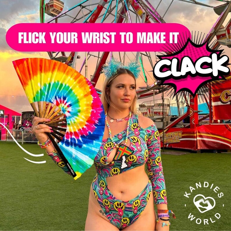 May include: A woman wearing a colorful, psychedelic print bodysuit with a cutout design. She is holding a rainbow tie-dye hand fan and has a beaded necklace with a smiley face charm. The text "FLICK YOUR WRIST TO MAKE IT CLACK" is displayed in a pink speech bubble. The background features a carnival setting with a Ferris wheel.