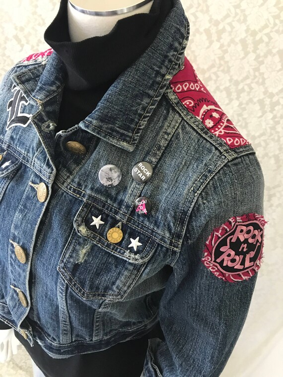 denim jacket with rock patches