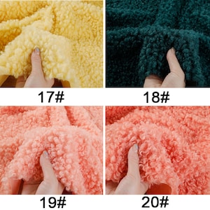 May include: Four fabric swatches in different colors: yellow, green, pink, and a lighter shade of pink. The fabric has a fluffy, fuzzy texture.