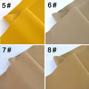 May include: Four fabric swatches, two in a light brown colour and two in a mustard yellow colour. The swatches are labelled with numbers 5, 6, 7, and 8.