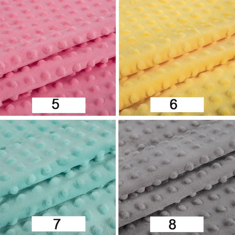 May include: Four fabric swatches with a textured dot pattern. The swatches are pink, yellow, light blue, and grey.