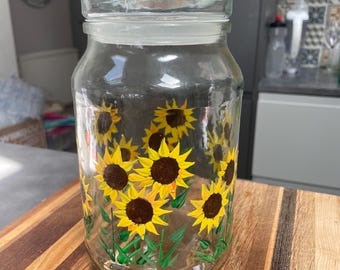 Hand sunflower design Storage Jar: Recycled Coffee Jar