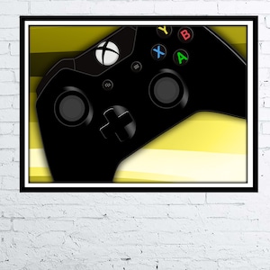 May include: A black video game controller with white buttons against a yellow and white striped background.