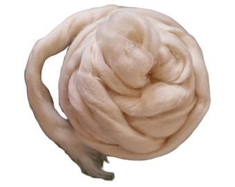 May include: A large clump of white cotton fiber, perfect for crafting and filling projects.