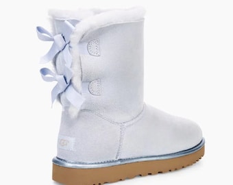 beige uggs with bows beige uggs with bows