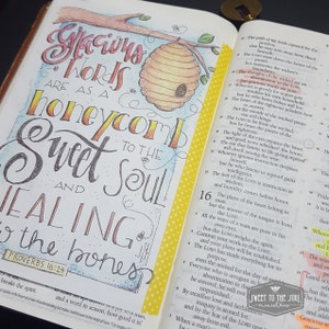 May include: A close-up of a page from a book with a hand-drawn illustration of a honeycomb and the words "Gracious words are as a honeycomb sweet to the soul and healing to the bones." The text "Proverbs 16:24" is also visible.