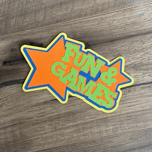 Fun & Games title paper piecing die cut