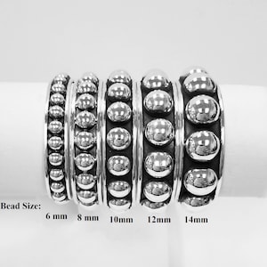 Puede incluir: Cinco pulseras de plata con cuentas de diferentes tama&ntilde;os. Los tama&ntilde;os de las cuentas son 6 mm, 8 mm, 10 mm, 12 mm y 14 mm.