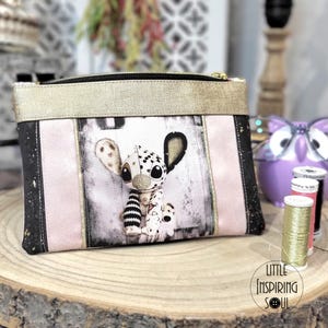 Roze en zwarte patchwork platte etui met ritssluiting van imitatieleer en luxe kurk.