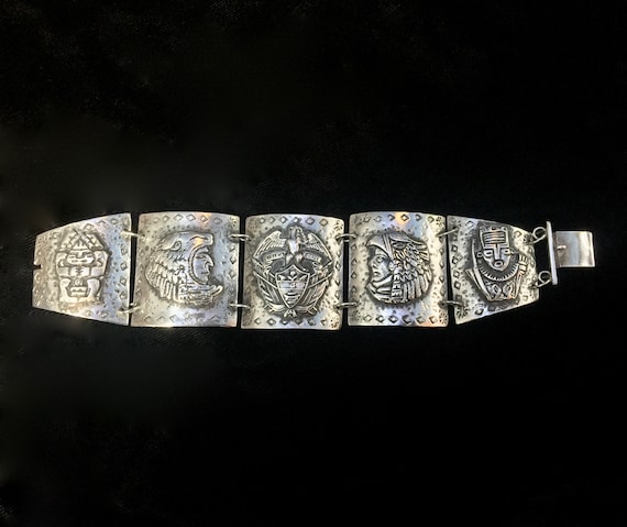 Silver Tribal faces Bracelet