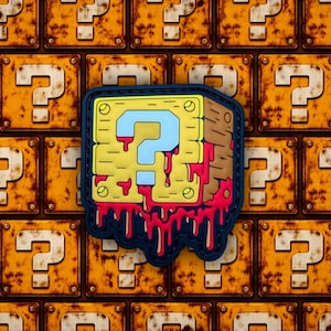 May include: A yellow, brown, and blue question mark patch with red dripping accents. The patch is square-shaped with a blue border. The background is a repeating pattern of rusty yellow question mark blocks.